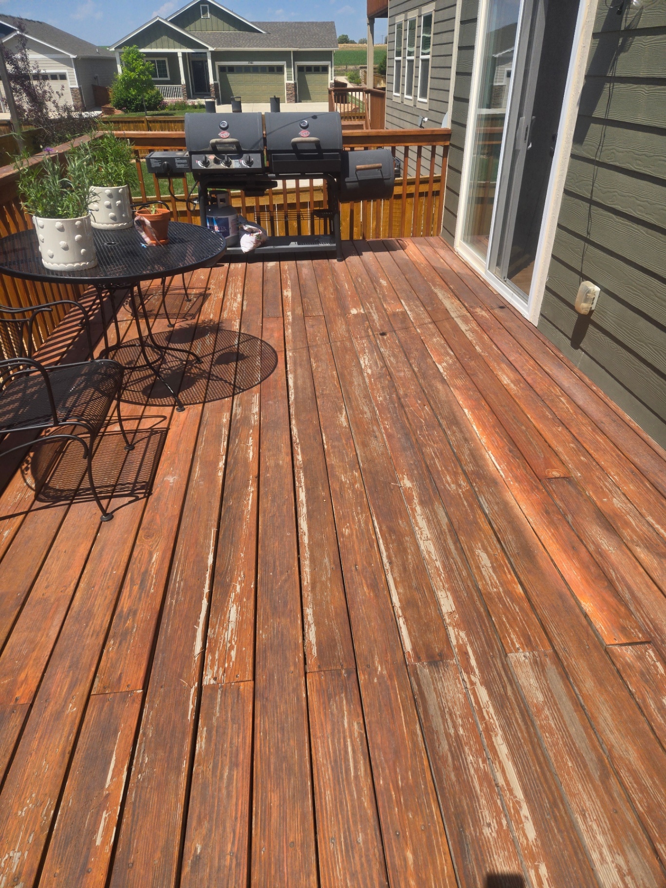 Deck strip & re-stain — before